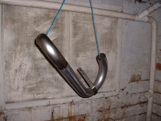 Lower drivers side pipe, pre-primer.