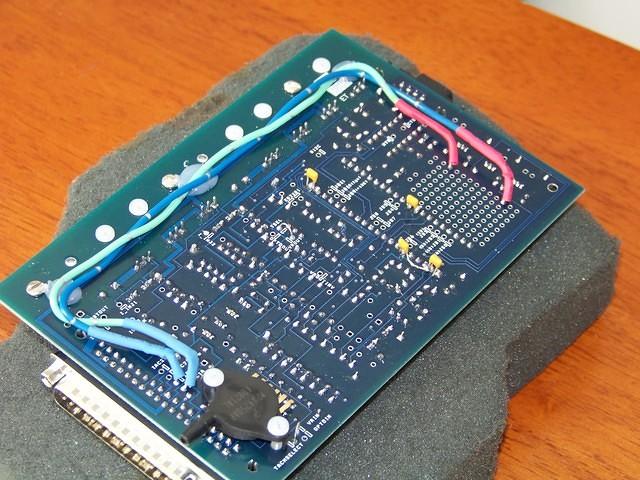 Underside view, notice the .1uF filtering caps installed on CPU pins 1/2, 2/6, 32/32 and 39/40.