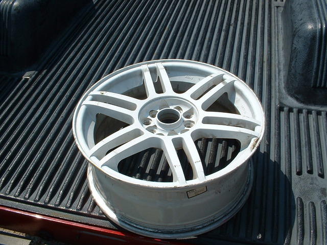 Pretty much what they all looked like. Some no-name brand of wheel that came on the MR2.